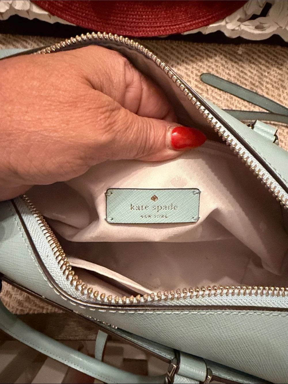 Kate Spade Devyn Medium Duffel Bag in the color Frosted Spearmint, featuring